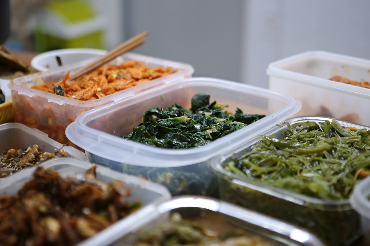 Professional workspace with healthy meal preparation